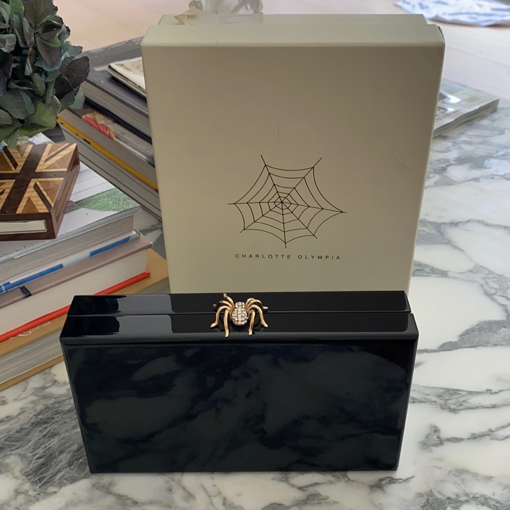 Charlotte Olympia plexi clutch